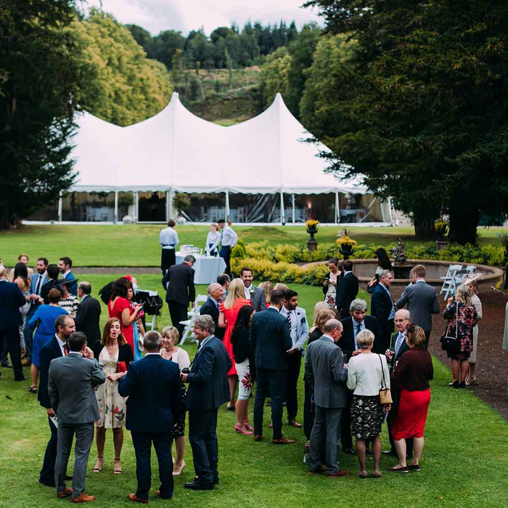 Group-outside-wedding-marquee Marquee hire scotland enjoying the wedding